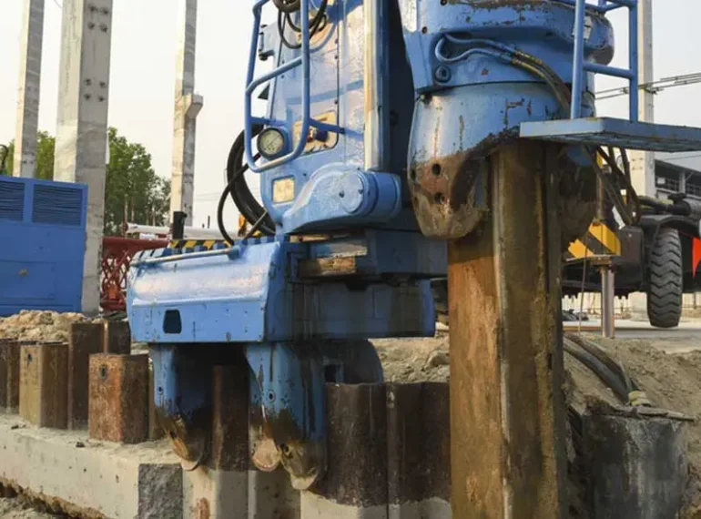 A hydraulic rig in action, installing a sheet pile